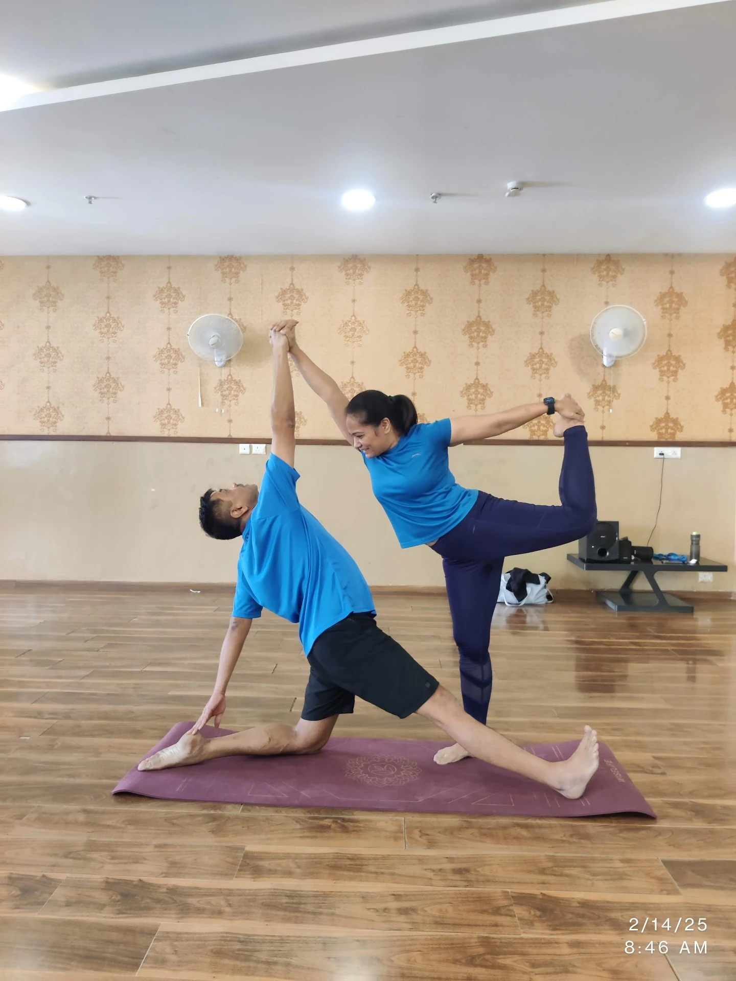 Partner Yoga at Yoga With Jigisha - Two students in synchronized Natarajasana pose at Bangalore studio