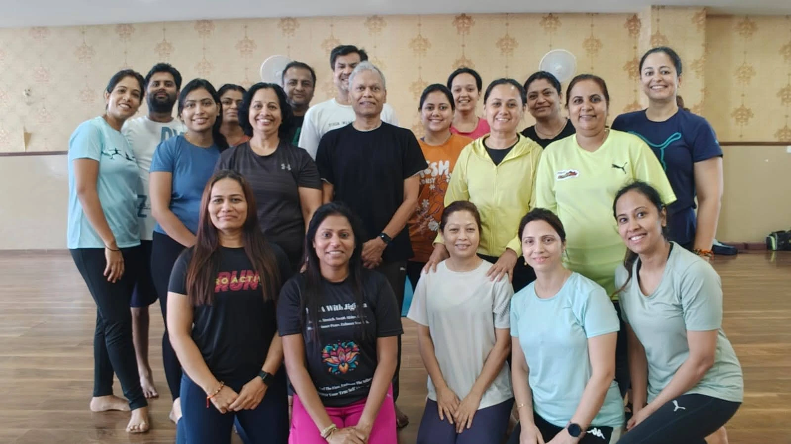 Diverse Group Yoga Practice - Students of all ages practicing together in harmony