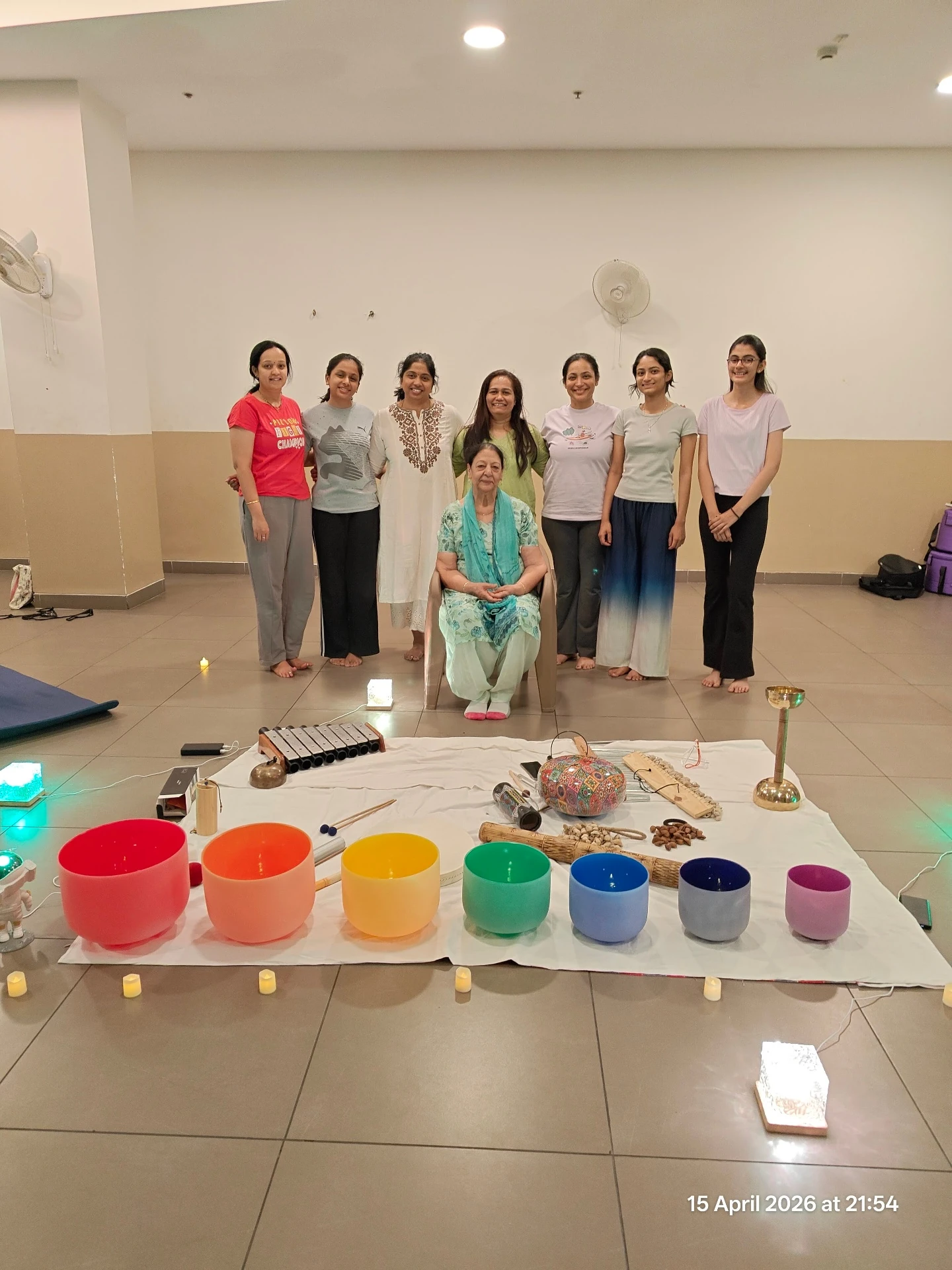 Group Sound Healing session with rainbow Crystal Singing Bowls and accessories at Yoga With Jigisha Bangalore