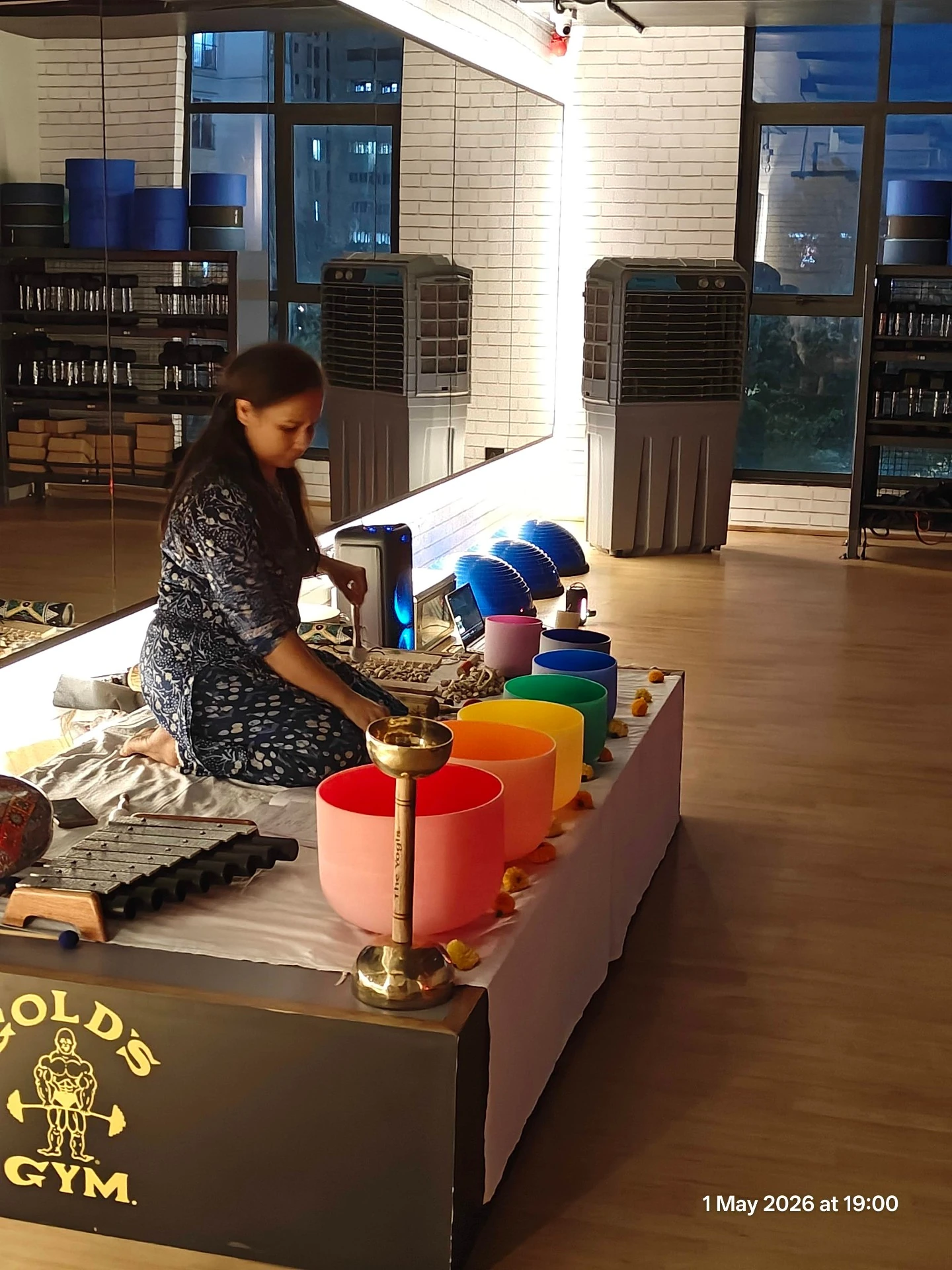Jigisha Parikh leading Sound Bath session in progress with Crystal Bowls at Gold's Gym Yelenahalli Bangalore Yoga With Jigisha
